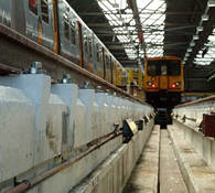 Poured Concrete Repair Works to a Reinforced Concrete Structural Rail Support Beam NCC